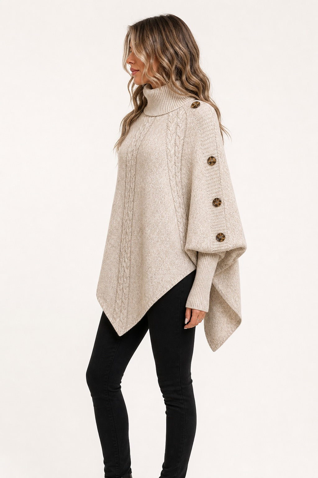 Florence Cable Cape Sweater in khaki side view showing the buttoned cape edge and layered ribbed sleeve