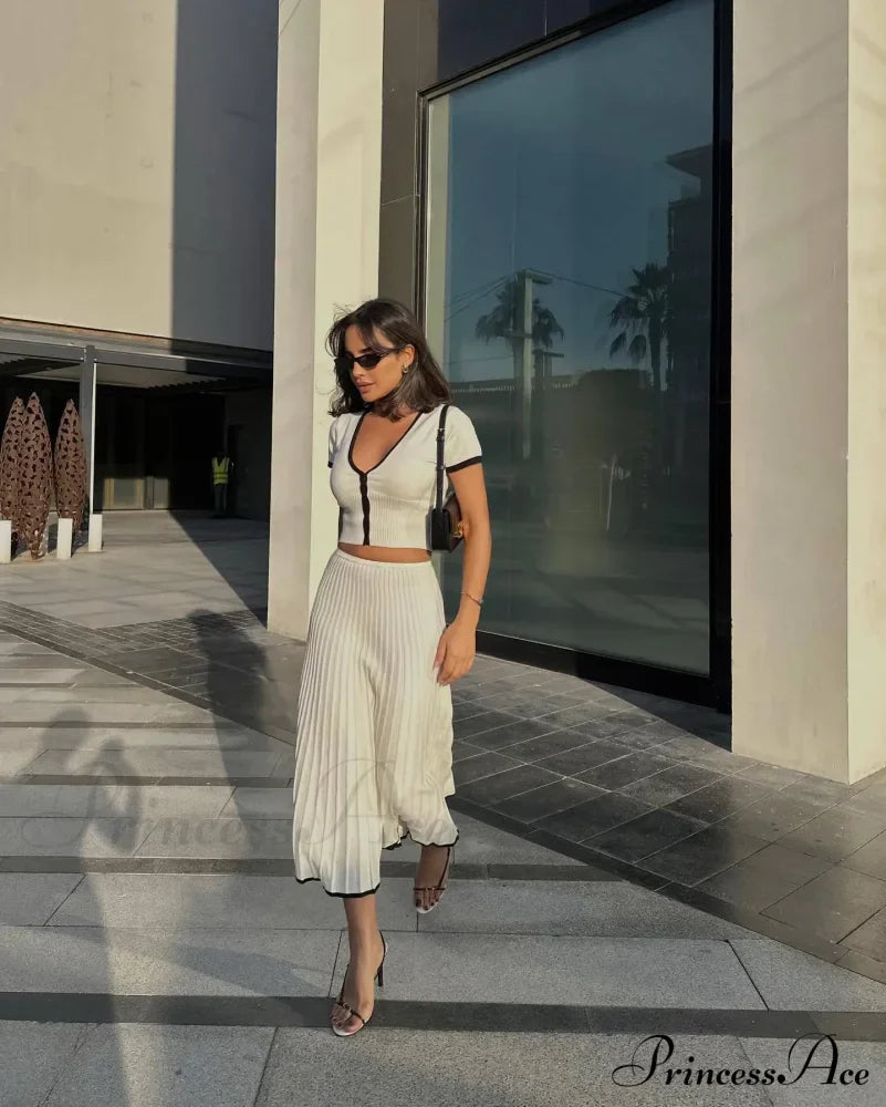 Knit Two Tone Short Sleeve Buttoned Modern Top And Pleated Midi Skirt Set image 18