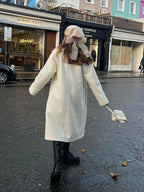 Tassel Turtleneck Irregular Button Overcoat image 6